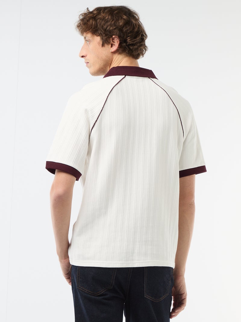 Polo in tessuto fantasia con collo polo senza bottoni Bianco - Kiabi