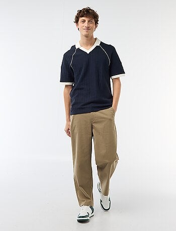 Polo in tessuto fantasia con collo polo senza bottoni