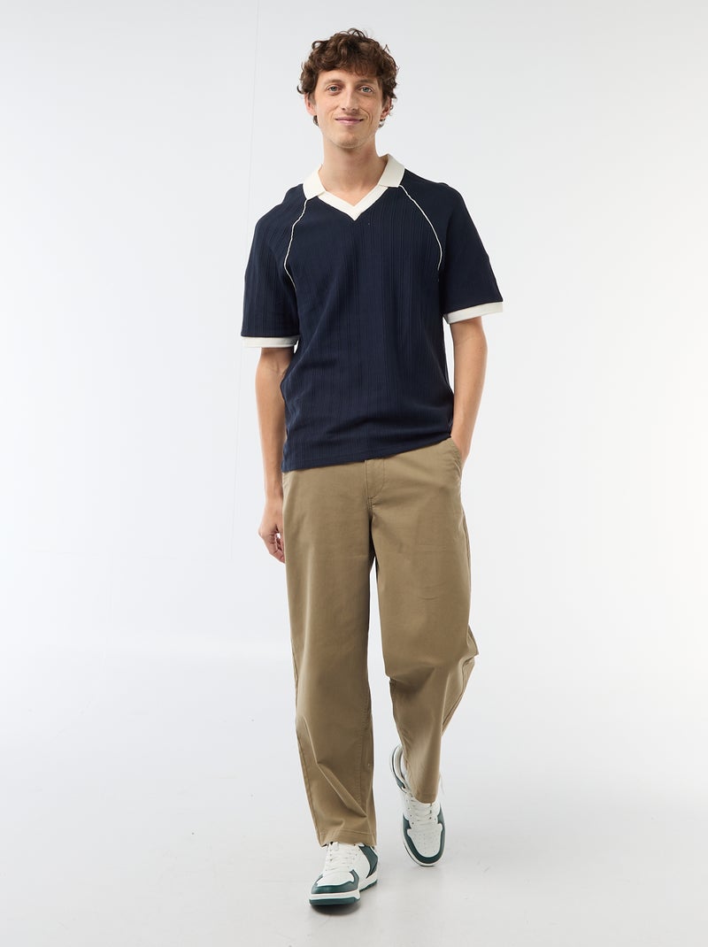 Polo in tessuto fantasia con collo polo senza bottoni Blu - Kiabi