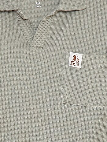 Polo loose fit con tasca