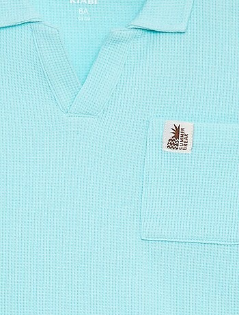Polo loose fit con tasca