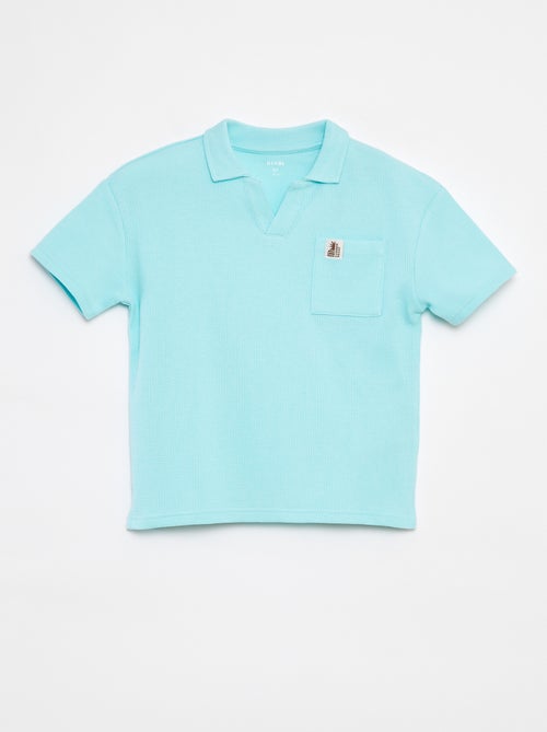 Polo loose fit con tasca - Kiabi