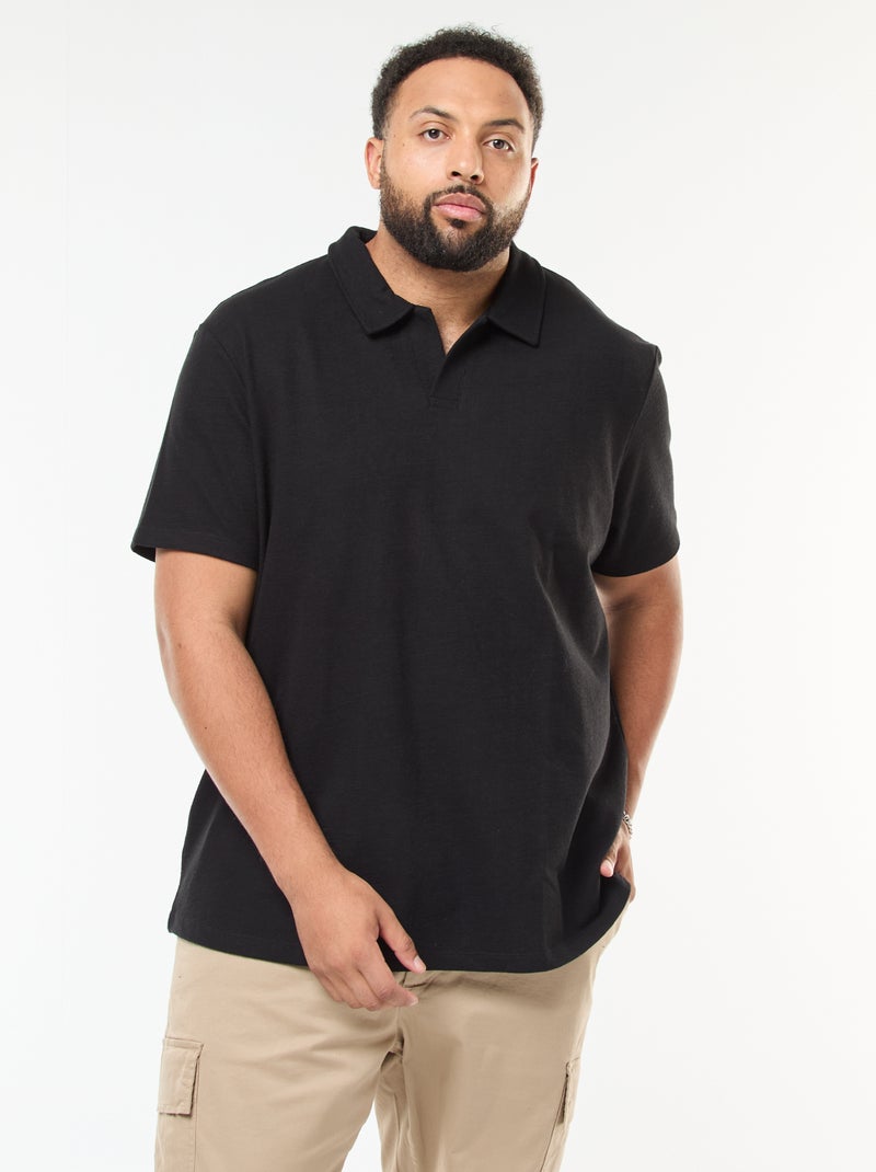 Polo regular in cotone tinta unita Nero - Kiabi