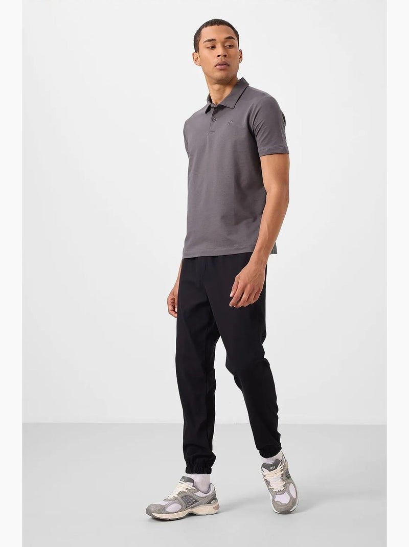 Polo t-shirt da uomo in cotone ed elastan tommy Grigio medio - Kiabi