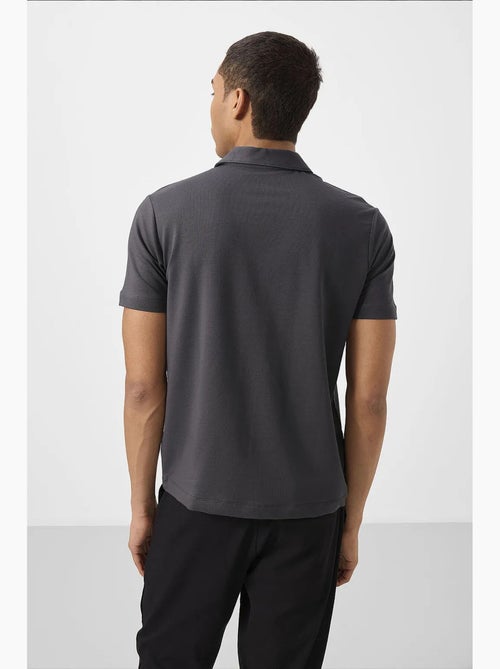 Polo t-shirt da uomo in cotone ed elastan tommy - Kiabi Polo t-shirt da uomo in cotone ed elastan tommy - Kiabi
