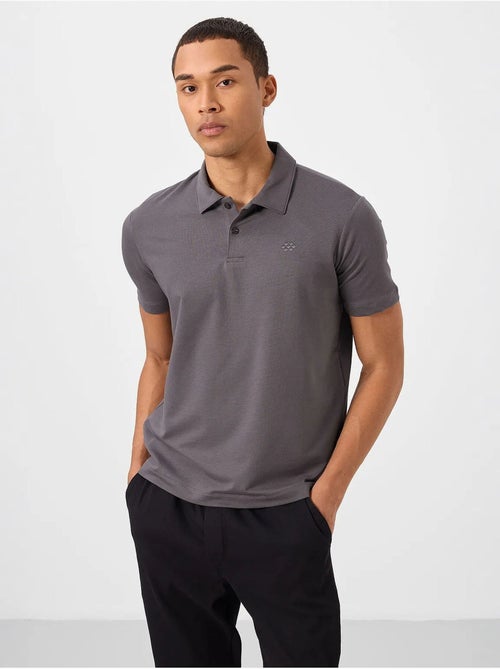 Polo t-shirt da uomo in cotone ed elastan tommy - Kiabi Polo t-shirt da uomo in cotone ed elastan tommy - Kiabi