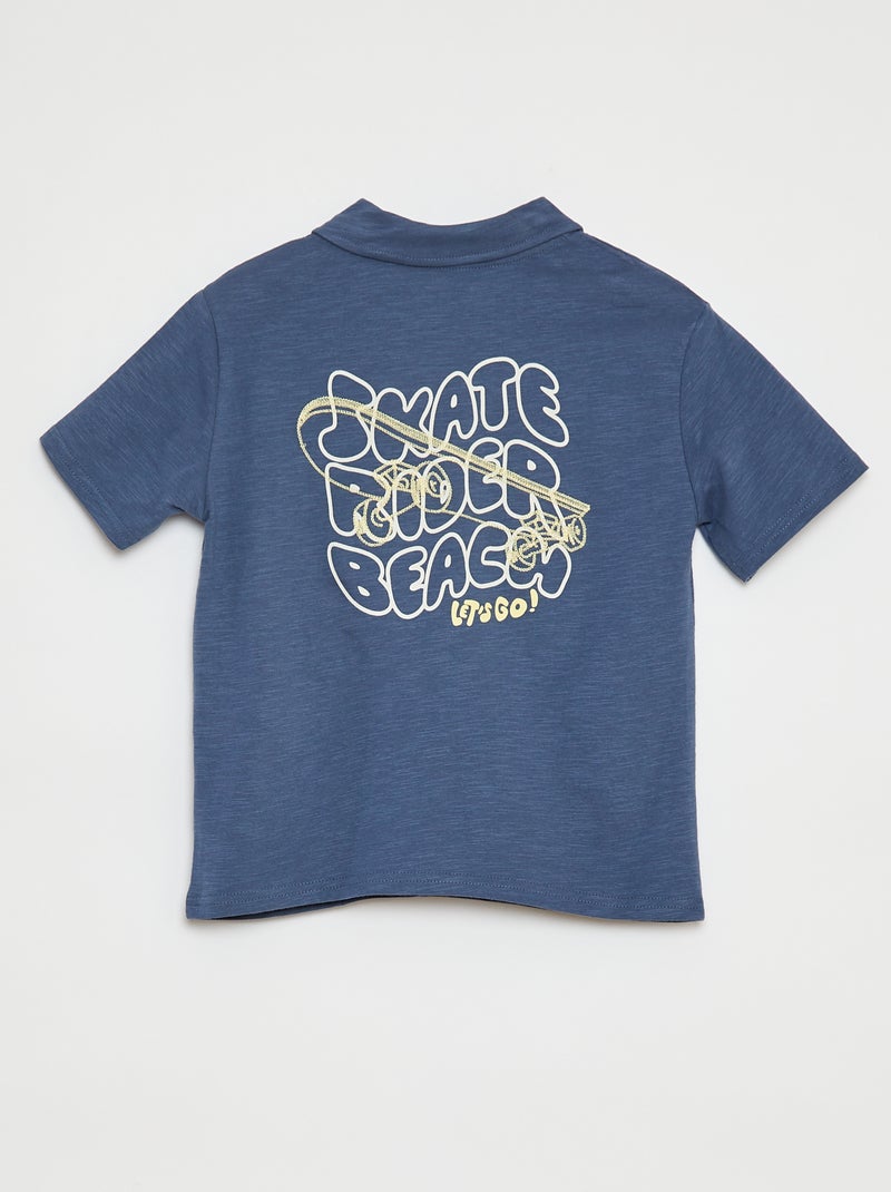 Polo tinta unita con stampa BLU - Kiabi