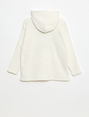 Poncho 'Harry Potter' in pile