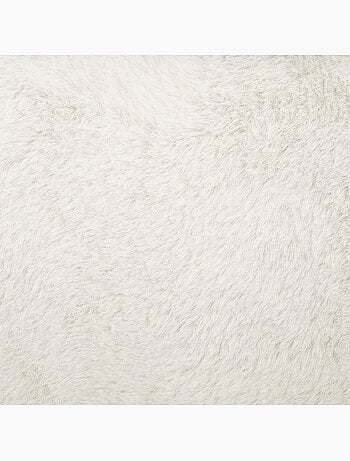 Pouf pieghevole ezzio in pelliccia bianca