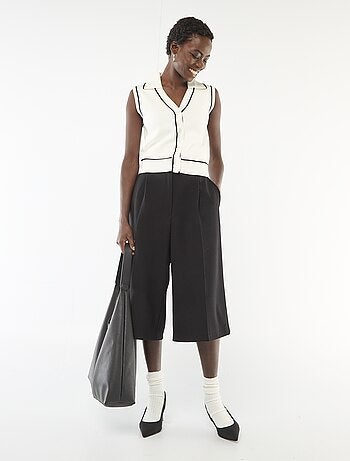 Pull senza maniche con collo polo