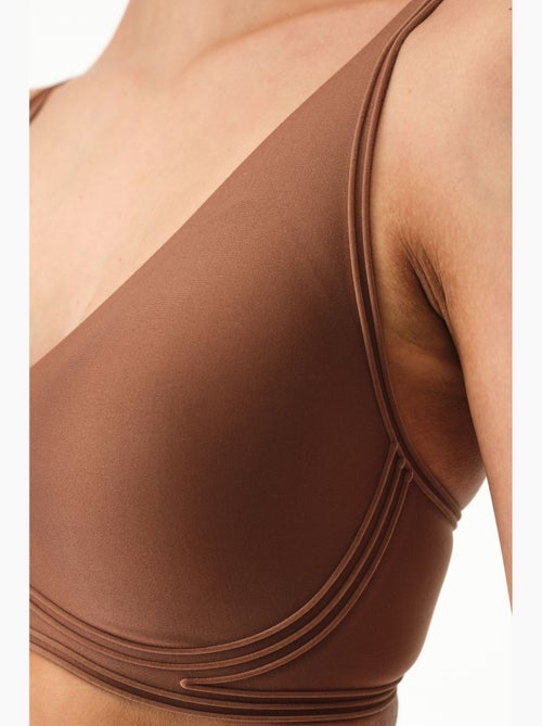 Reggiseno contorno invisibile con imbottiture removibili penti - Kiabi Reggiseno contorno invisibile con imbottiture removibili penti - Kiabi
