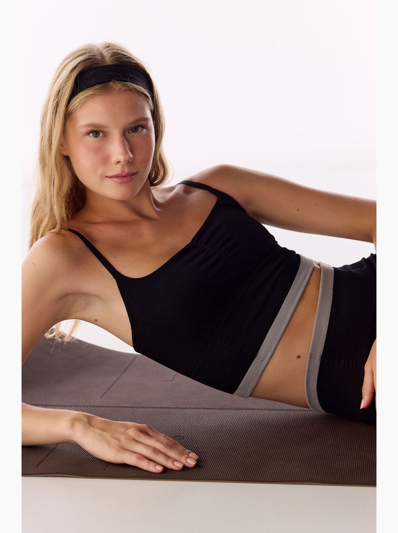 Reggiseno sportivo a righe senza cuciture penti Nero - Kiabi