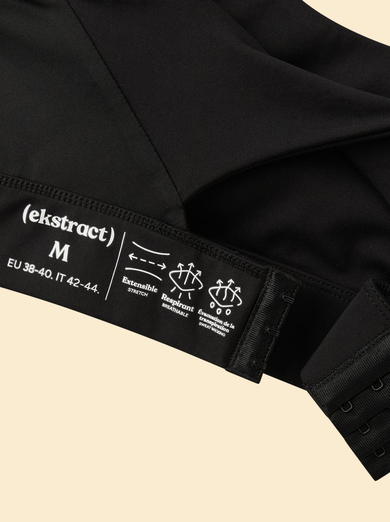 Reggiseno sportivo con effetto twist sul retro, sostegno forte - (ekstract) Nero - Kiabi