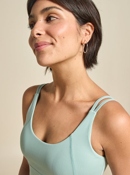 Reggiseno sportivo con effetto twist sul retro, sostegno forte - (ekstract) - Kiabi Reggiseno sportivo con effetto twist sul retro, sostegno forte - (ekstract) - Kiabi