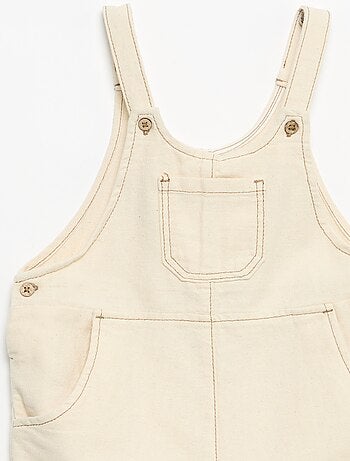 Salopette con tasche