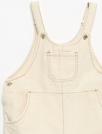 Salopette con tasche