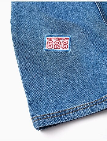 Salopette corta in denim con ricamo stitch