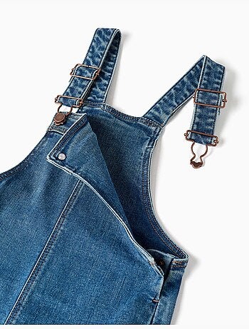 Salopette in denim a a gamba larga con orli sfrangiati