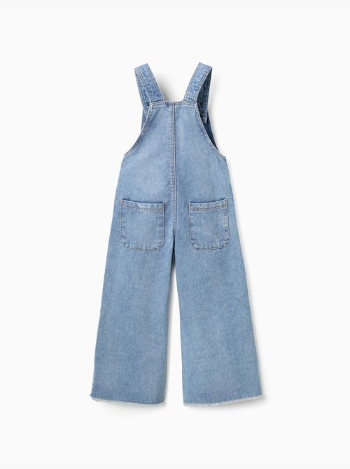 Salopette in denim a a gamba larga con orli sfrangiati - Kiabi