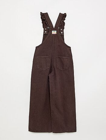 Salopette lunga in denim con bretelle a balze