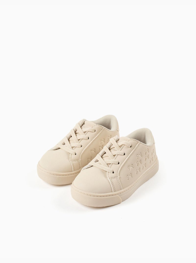 Scarpe da ginnastica con fiocchi in rilievo e lacci elastici Beige - Kiabi