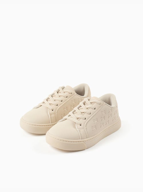 Scarpe da ginnastica con fiocchi in rilievo e lacci elastici - Kiabi Scarpe da ginnastica con fiocchi in rilievo e lacci elastici - Kiabi