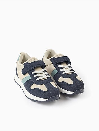 Scarpe sportive combinate con chiusura a strappo