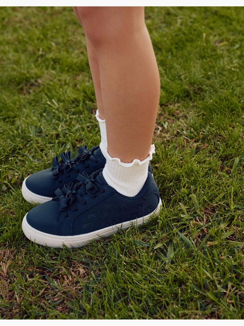 Scarpe sportive con fiocchi in rilievo - Kiabi