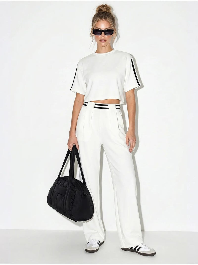 Set 2 pezzi con t-shirt girocollo e pantaloni a gamba ampia lucci Bianco - Kiabi