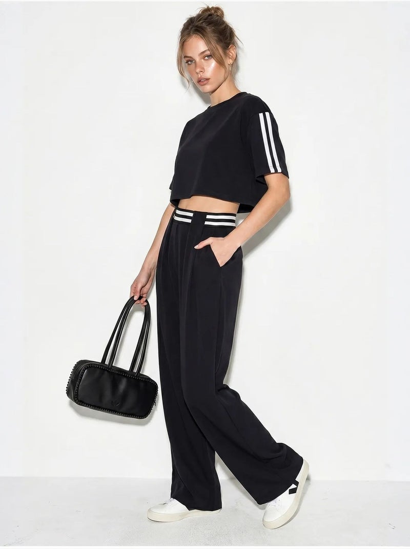 Set 2 pezzi con t-shirt girocollo e pantaloni a gamba ampia lucci Nero - Kiabi