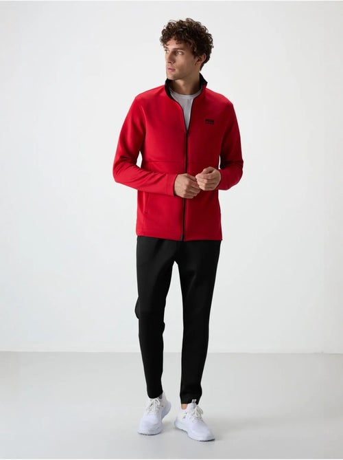 Set active da uomo in scuba di poliestere con collo con zip tommy - Kiabi Set active da uomo in scuba di poliestere con collo con zip tommy - Kiabi