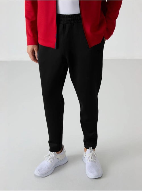 Set active da uomo in scuba di poliestere con collo con zip tommy - Kiabi Set active da uomo in scuba di poliestere con collo con zip tommy - Kiabi
