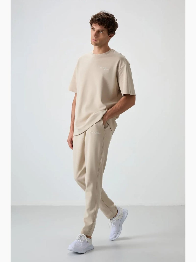 Set active in cotone-poliestere oversize da uomo tommy Beige argilla - Kiabi
