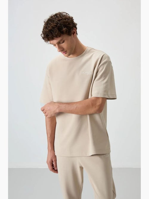 Set active in cotone-poliestere oversize da uomo tommy - Kiabi Set active in cotone-poliestere oversize da uomo tommy - Kiabi