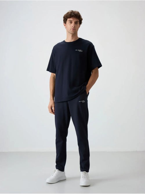 Set active in cotone-poliestere oversize da uomo tommy - Kiabi Set active in cotone-poliestere oversize da uomo tommy - Kiabi