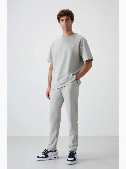 Set active in cotone-poliestere oversize da uomo tommy - Kiabi Set active in cotone-poliestere oversize da uomo tommy - Kiabi