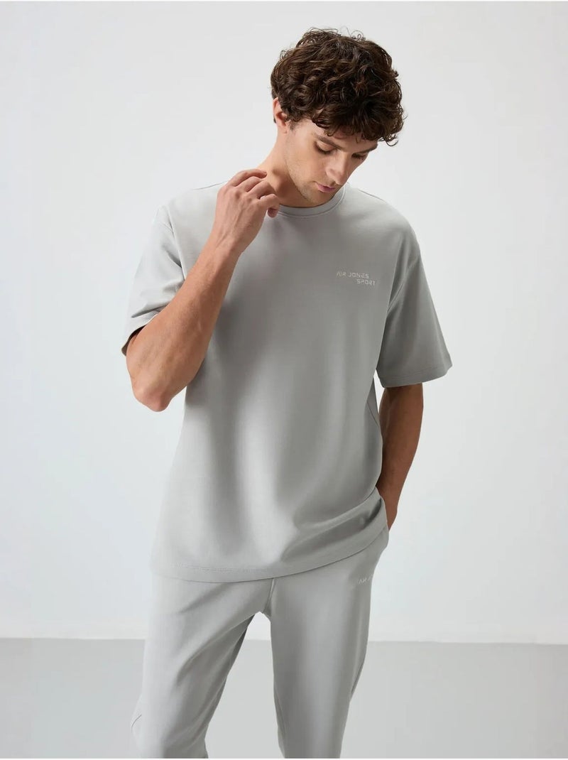 Set active in cotone-poliestere oversize da uomo tommy Grigio chiaro - Kiabi