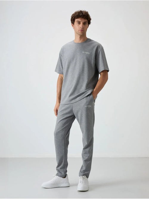 Set active in cotone-poliestere oversize da uomo tommy - Kiabi Set active in cotone-poliestere oversize da uomo tommy - Kiabi