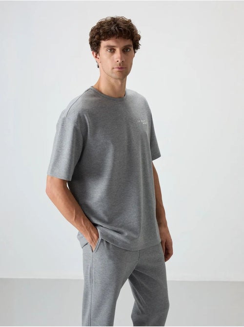 Set active in cotone-poliestere oversize da uomo tommy - Kiabi Set active in cotone-poliestere oversize da uomo tommy - Kiabi