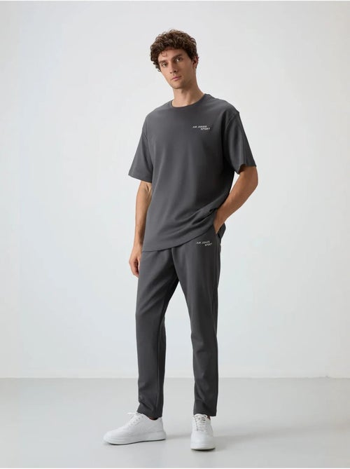 Set active in cotone-poliestere oversize da uomo tommy - Kiabi Set active in cotone-poliestere oversize da uomo tommy - Kiabi