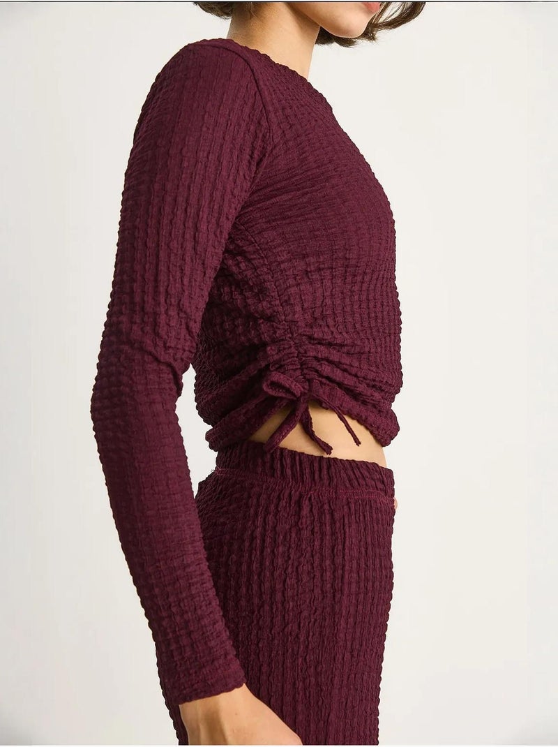 Set co-ord a due pezzi aderente con pantaloni a zampa lucci Malva - Kiabi