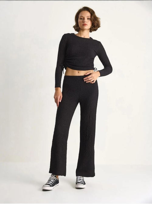 Set co-ord a due pezzi aderente con pantaloni a zampa lucci - Kiabi Set co-ord a due pezzi aderente con pantaloni a zampa lucci - Kiabi