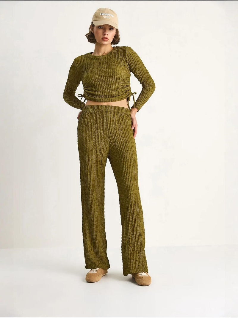 Set co-ord a due pezzi aderente con pantaloni a zampa lucci Verde - Kiabi