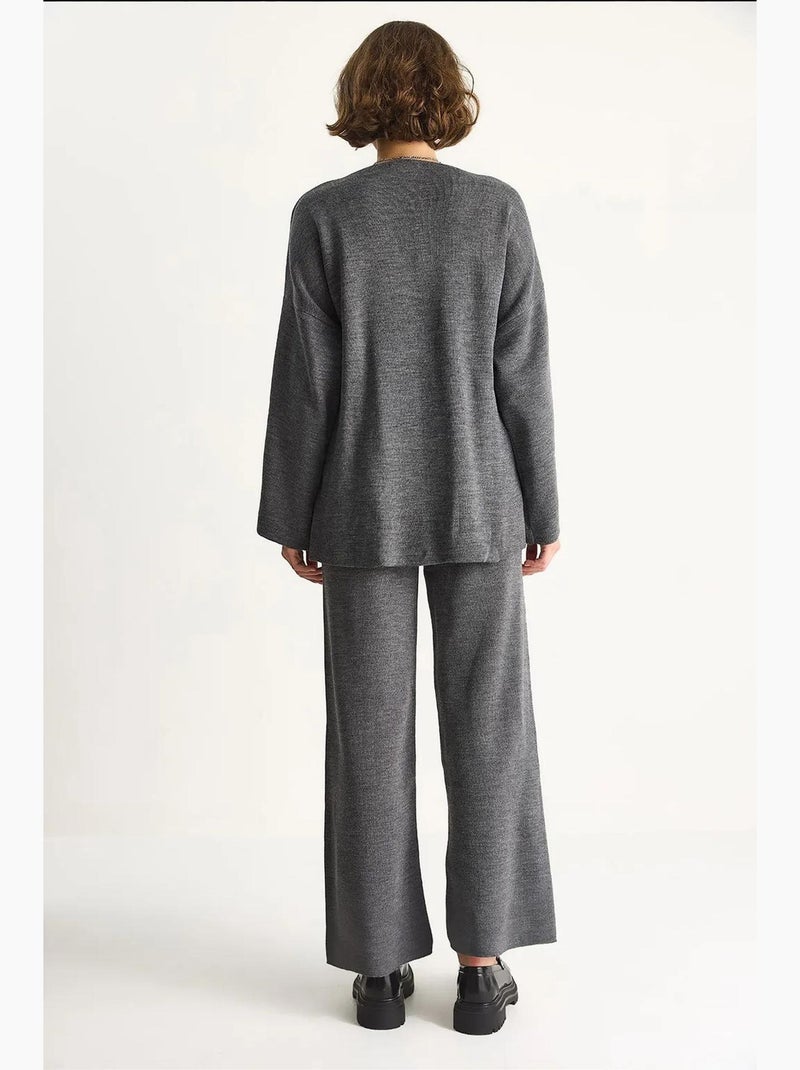 Set con blusa con fiocco doppiopetto e pantaloni a gamba ampia lucci Grigio nero - Kiabi