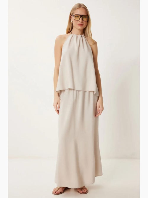 Set con blusa halter con dettaglio a laccetti e gonna a gamba ampia istanbul - Kiabi Set con blusa halter con dettaglio a laccetti e gonna a gamba ampia istanbul - Kiabi