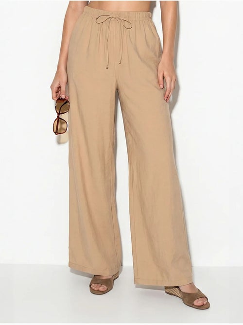 Set con blusa senza spalline con volant e pantaloni a gamba ampia lucci - Kiabi Set con blusa senza spalline con volant e pantaloni a gamba ampia lucci - Kiabi