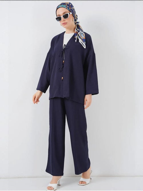 Set con cardigan con scollo a v e pantaloni a gamba larga bdart - Kiabi Set con cardigan con scollo a v e pantaloni a gamba larga bdart - Kiabi