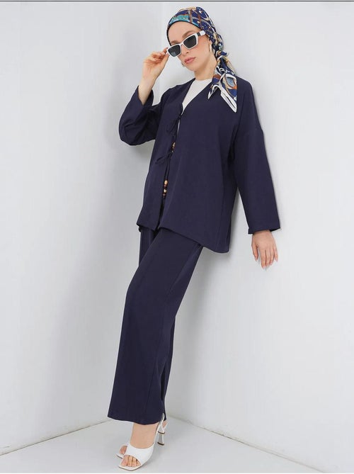 Set con cardigan con scollo a v e pantaloni a gamba larga bdart - Kiabi Set con cardigan con scollo a v e pantaloni a gamba larga bdart - Kiabi