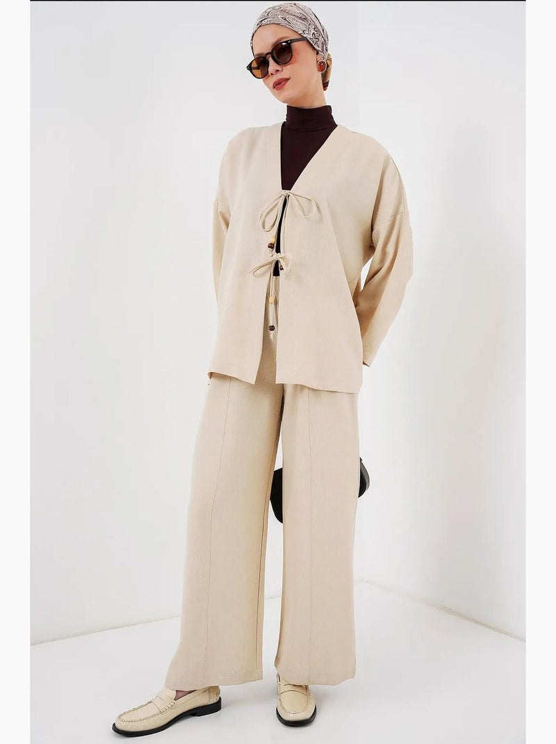 Set con cardigan con scollo a v e pantaloni a gamba larga bdart Crema - Kiabi