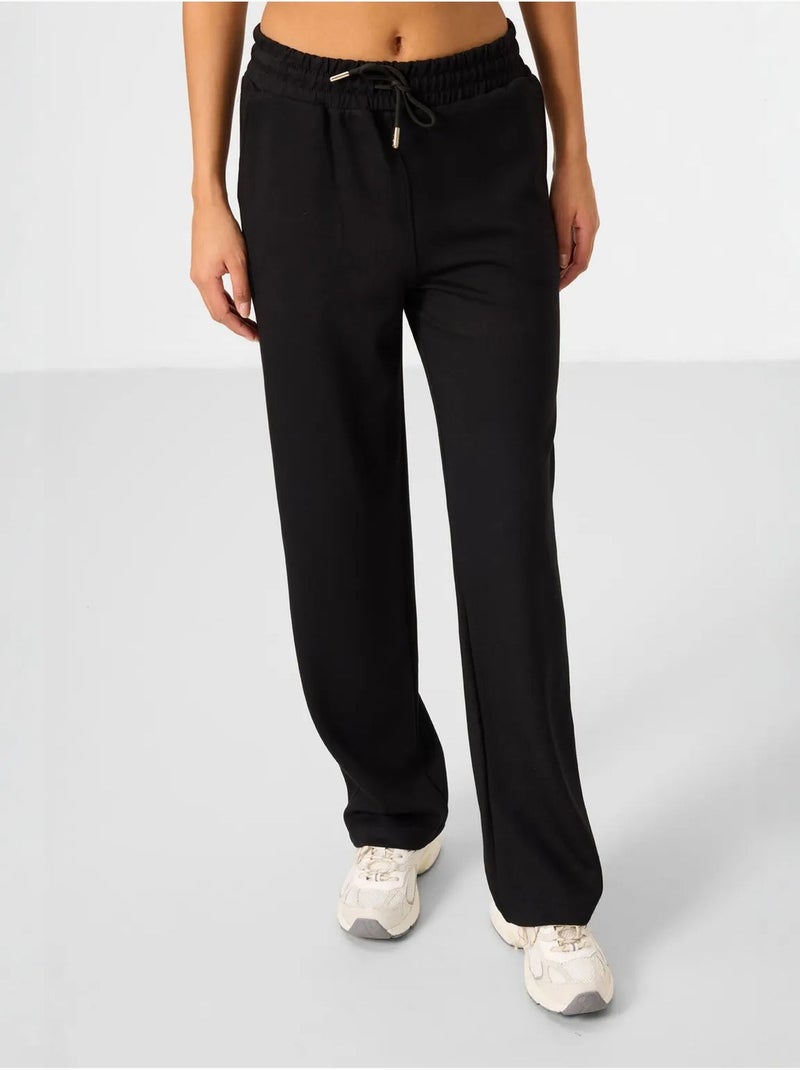 Set con felpa con cappuccio oversize e pantaloni a gamba ampia tommy Nero - Kiabi